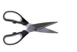 Close up view of kitchen scissors on white background. 