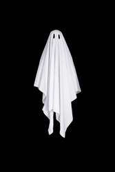 White ghost with black eyes, made from a bedsheet. Isolated on black background.