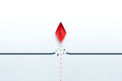 Concept of overcoming barriers, goal, target, with red paper ship breaking through obstacle on white background