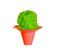 Lime green Hawaiian style shave ice, shaved ice or a snow cone in a red or pink flower shaped cup on a white background with copy space
