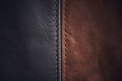 Leather with beautiful patterns and textures and stitched seams.Leather concept in vintage tones