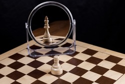 A chess pawn looks in the mirror and sees himself as a king. Often in life, things and people are not what they seem. Trust yourself, the concept of self-confidence