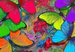 colors of rainbow. color concept. bright tropical morpho butterflies on an artist's palette. art paints and butterflies colorful background