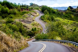 A curvey section of the Wasmea canyon road on the island of kauai, Hawaii.