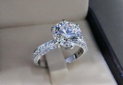 Diamond engagement ring isolated in box.