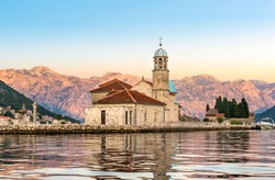 Dawn over Our Lady of the Rock island in Perast, Montenegro