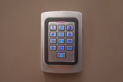 Secure password on keyboard for opening office. Password code Security keypad system protected in Public Building. The security code combination to unlock the door