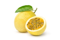 Yellow  passion fruit with cut in half and green leaf isolated on white background. Clipping path.