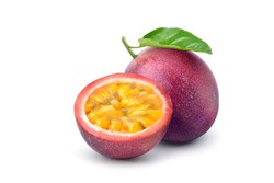 Purple passion fruit (Passiflora edulis) with cut in half and green leaf isolated on white background. Clipping path.
