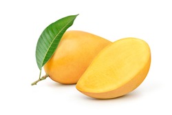 Ripe yellow Mango with cut in half and green leaf isolated on white background.