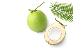 Flat lay of Coconut juice splash in half fruit isolated on white background.