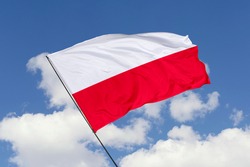 Poland flag isolated on sky background with clipping path. close up waving flag of Poland. flag symbols of Poland.