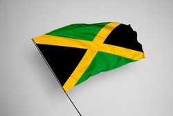 Jamaica flag isolated on white background with clipping path. close up waving flag of Jamaica. flag symbols of Jamaica. Jamaica flag frame with empty space for your text. 
