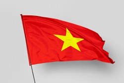 Vietnam flag isolated on white background. National symbol of Vietnam. Close up waving flag with clipping path.