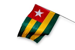 Togo flag isolated on white background. close up waving flag of Togo. flag symbols of Togolese.