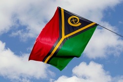 Vanuatu flag isolated on sky background. close up waving flag of Vanuatu. flag symbols of Vanuatuan.
