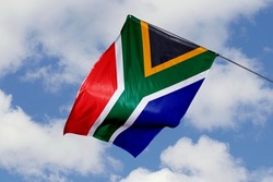 South Africa flag isolated on sky background. close up waving flag of South Africa. flag symbols of South African.