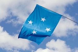 Micronesia flag isolated on sky background. close up waving flag of Micronesia. flag symbols of Micronesian.