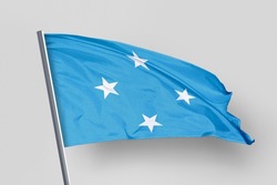 Micronesia flag isolated on white background. close up waving flag of Micronesia.