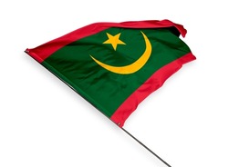 Mauritania's flag is isolated on a white background. flag symbols of Mauritania. close up of a Mauritanian flag waving in the wind.
