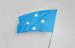 The Micronesia flag is isolated on a white background with a clipping path. flag symbols of Micronesia. flag frame with empty space for your text.