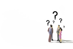 A small group of miniature businessman 
stand meeting searching answer on white background.