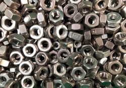 Collection of threaded nuts.Engineering Metal Tools.