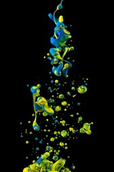 Photograph of an ink drop forming color bubbles underwater. Liquids mixing in dynamic flow forming round shapes with vivid structure. A detailed colorful abstract design isolated on black background. 