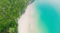 ฺBeautiful Top View, Wave of Turquoise ocean water on sandy beach, High angle view sea and sand background, Aerial top view of Khanom beach, Khanom, Nakhon Si Thammarat Thailand