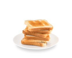 Pile of toasted bread slices on a single white plate.  On pure white background.