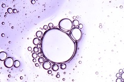 clear texture of purple bubbles on a light background