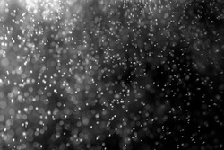 abstract splashes of water or snow on a dark background