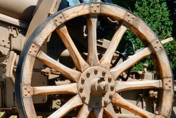 Close up view of wooden wheel of historical cannon Norwood MA USA