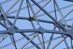 Closeup of Geometric patterns of girder steel arch of Bourne bridge Massachusetts