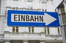 blue street sign in Vienna, Austria with the German word for 