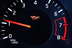Oil pressure warning light illuminated on dashboard. 