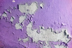 Close up of old stucco cracks on the wall. Weathered paint cracks on plaster. Cracked wall background. Abstract Web Banner