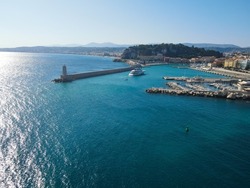 Aerial view of Nice sea and port, in Nizza region, France Nice's Roofs and Promenade des Anglais. Drone view of Provence-Alpes-Côte d'Azur. Nice is a city located on the French Riviera.