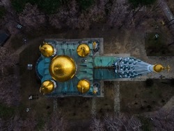 Aerial view of Shipka Memorial Church in Bulgaria. Drone view of Monastery Holy Nativity, known as Russian church in town of Shipka, Stara Zagora Region, Bulgaria. Birth of Christ with Golden domes.