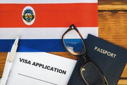 Flag of Costa Rica , visa application form and passport on table