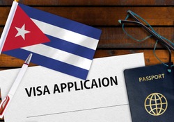 Flag of Cuba , visa application form and passport on table