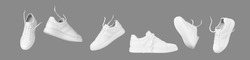 Flying white leather sneakers isolated on gray background. Fashionable stylish sports casual shoes. Creative minimalistic layout with footwear. Advertising for shoe store, blog