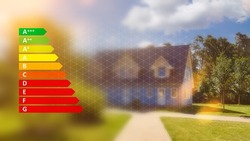 Energy label graphic in front of your own home or family house as an efficiency concept