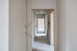 Hallway or corridor as a passage in the house in a new building during the interior design
