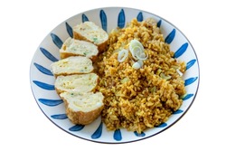 Top view of Fried rice curry with rolled egg thai style, focus selective