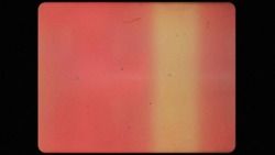Vintage Super 8mm Red Film Strip Frame Overlay Placeholder with Yellow Light Leaks, Dust and Speckles