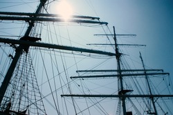 Low angle view of three masts of a sailing ship