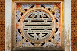 Ceramic Decorative Art On The Wall Of A Palace In Hue Imperial Citadel. The Imperial Citadel Of Hue, A UNESCO Cultural Heritage Is A Major Tourist Destination In Vietnam.