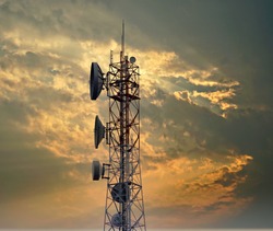 Base Station or Base Transceiver Station. Telecommunication tower. Wireless Communication Antenna Transmitter. Development of communication systems in urban area at sunset.