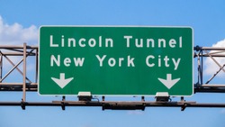 Lincoln Tunnel and New York City green road signs